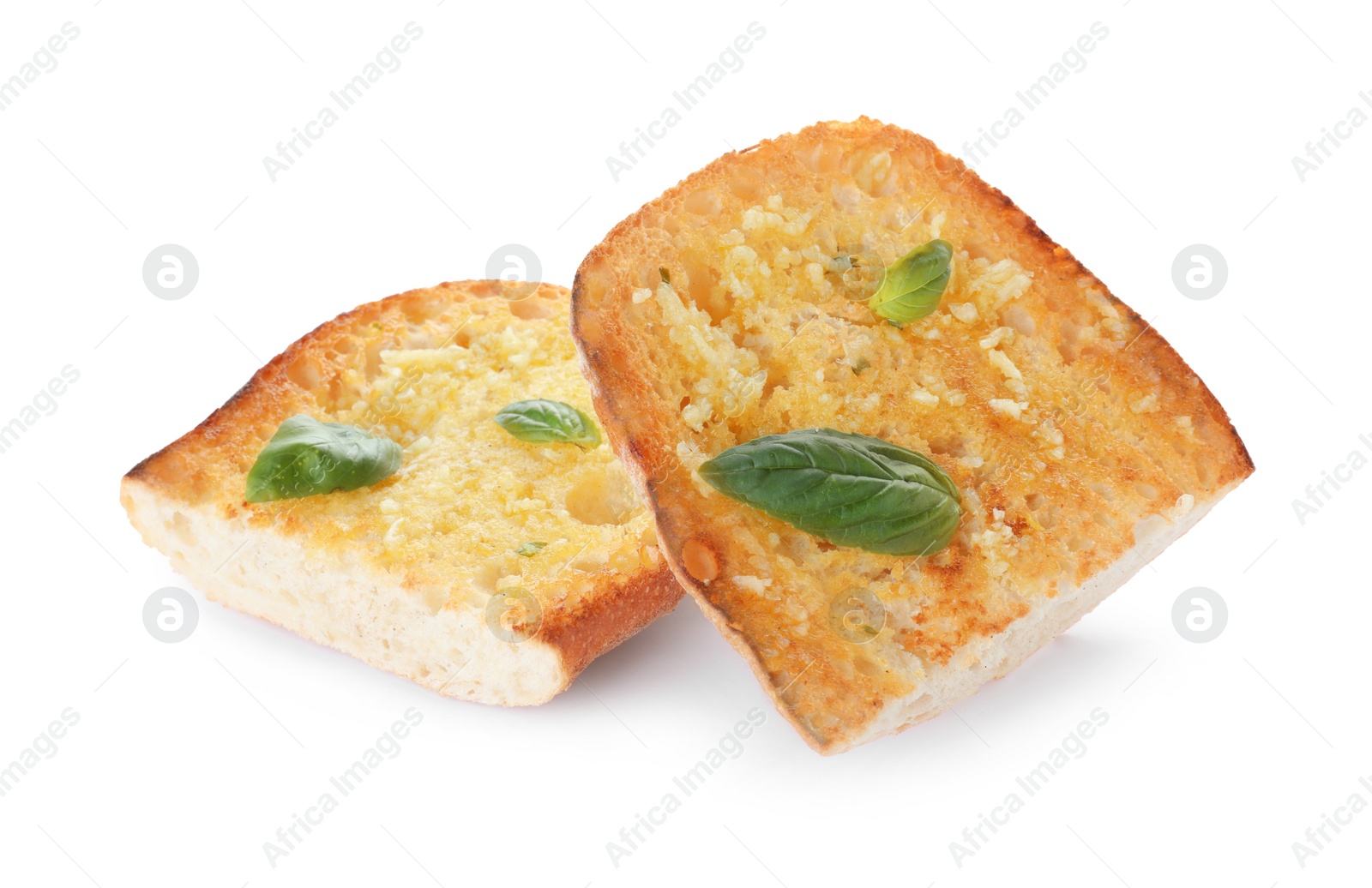 Photo of Slices of toasted bread with garlic and herb on white background