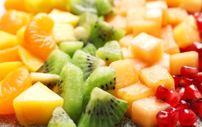 Photo of Different fresh cut fruits, closeup