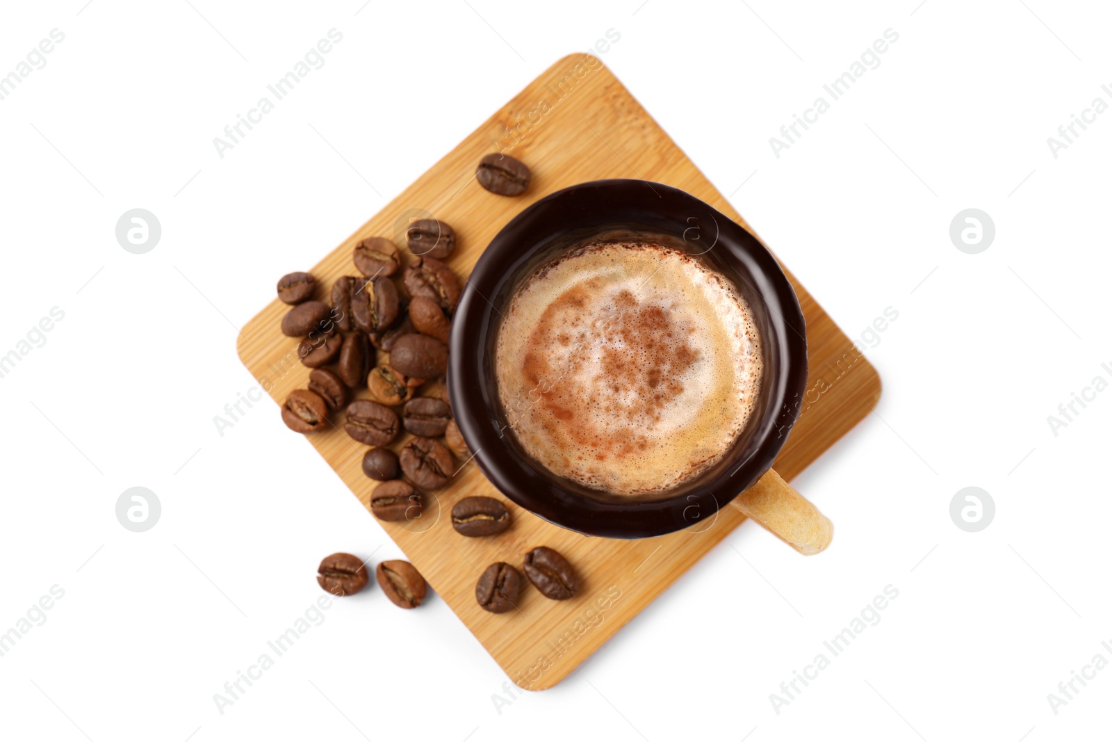 Photo of Delicious edible biscuit cup with coffee and roasted beans on white background, top view