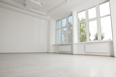 New empty room with clean windows and white walls