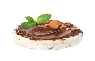 Photo of Puffed rice cake with chocolate spread, nuts and mint isolated on white