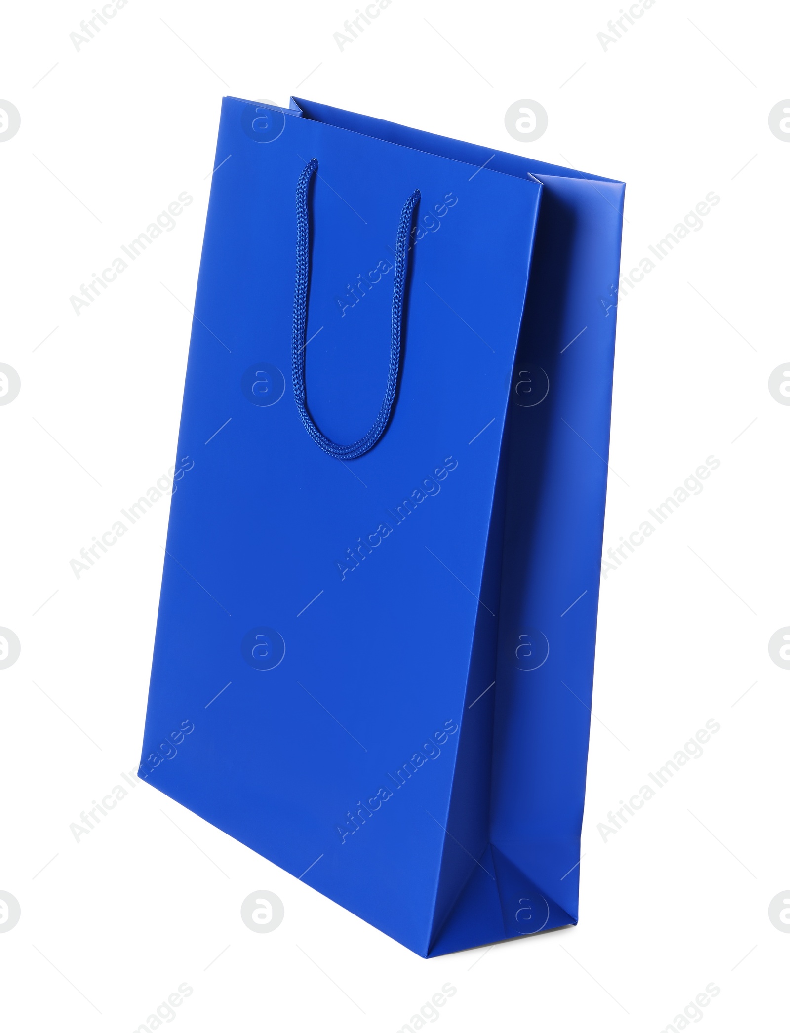 Photo of One blue shopping bag isolated on white