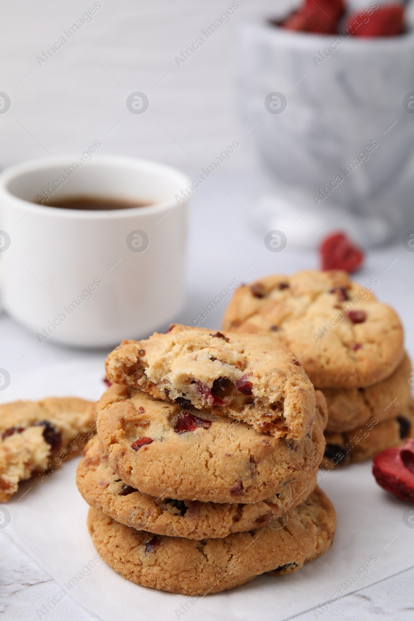 Cookies with freeze dried fruits and nuts on white marble table, closeup Photo of Cookies with freeze dried fruits and nuts on white marble table, closeup