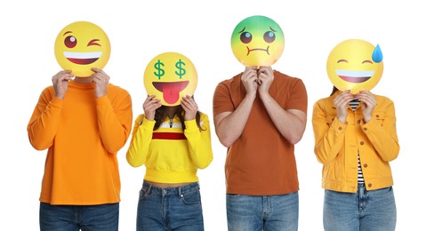 Photo of People covering faces with emoticons on white background