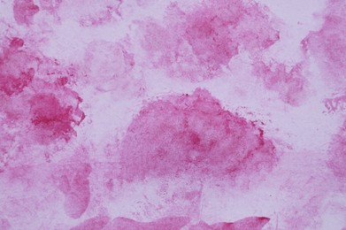 Abstract magenta watercolor painting as background, top view