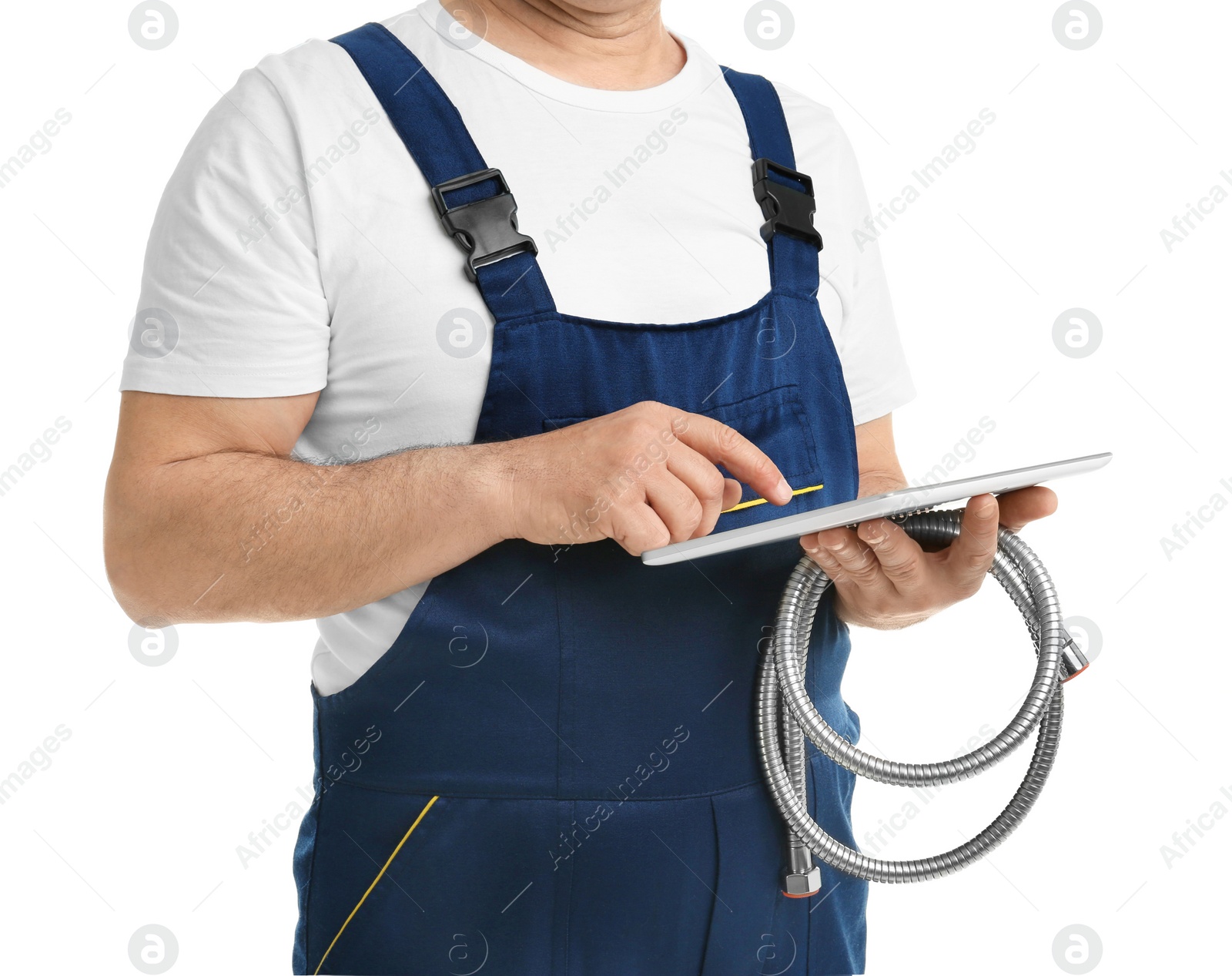 Photo of Mature plumber with tablet computer and hose on white background