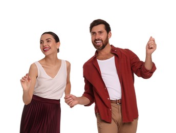 Happy couple dancing together on white background