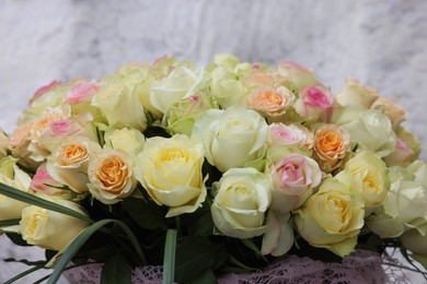 Photo of Bouquet of different beautiful roses, closeup view