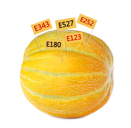 Image of Fresh melon with E numbers isolated on white. Harmful food additives 