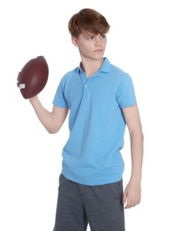 Teenage boy with american football ball on white background