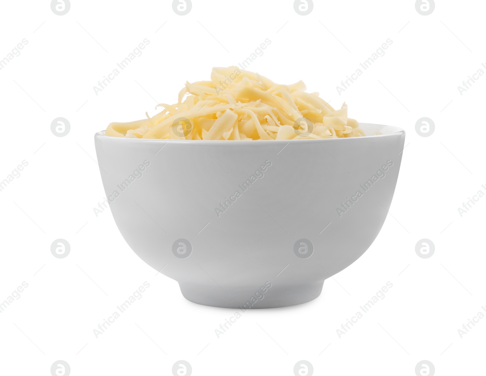 Photo of Tasty grated cheese in bowl isolated on white