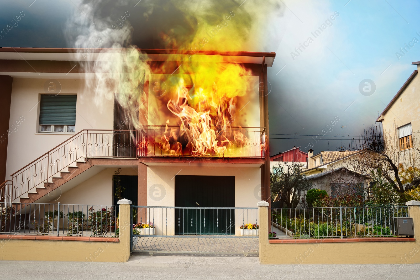 Image of Modern house engulfed in flames. Fire safety violations