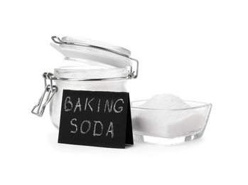 Photo of Jar and bowl with baking soda on white background
