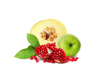 Image of Ripe juicy apple, pomegranate and melon on white background