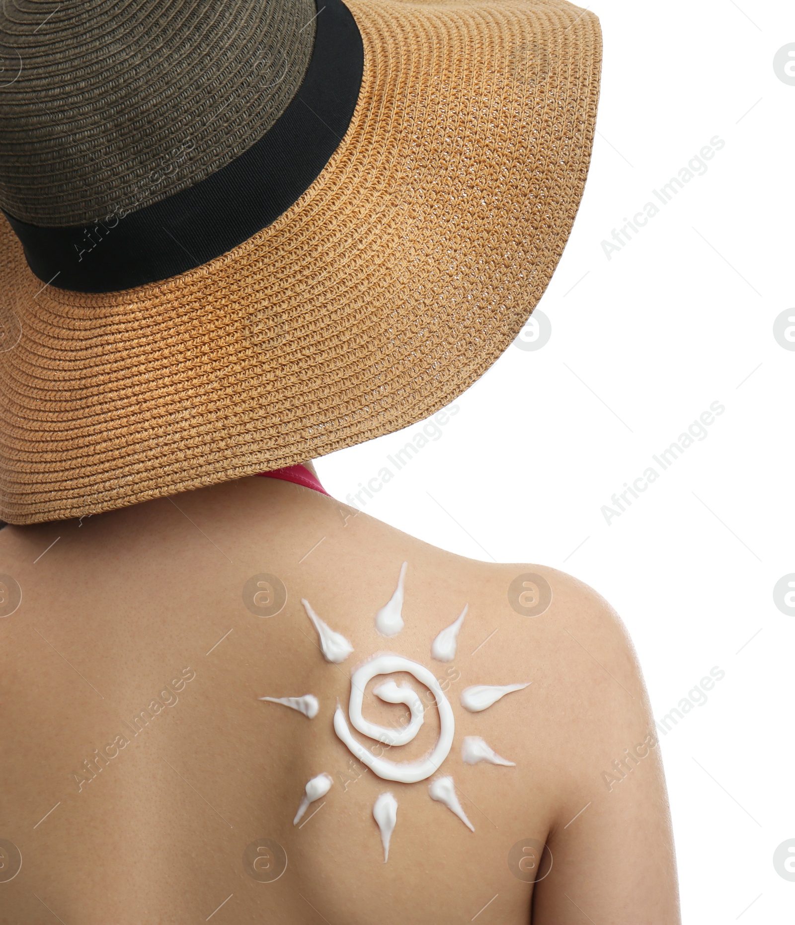 Photo of Young woman with sun protection cream on her back against white background, closeup