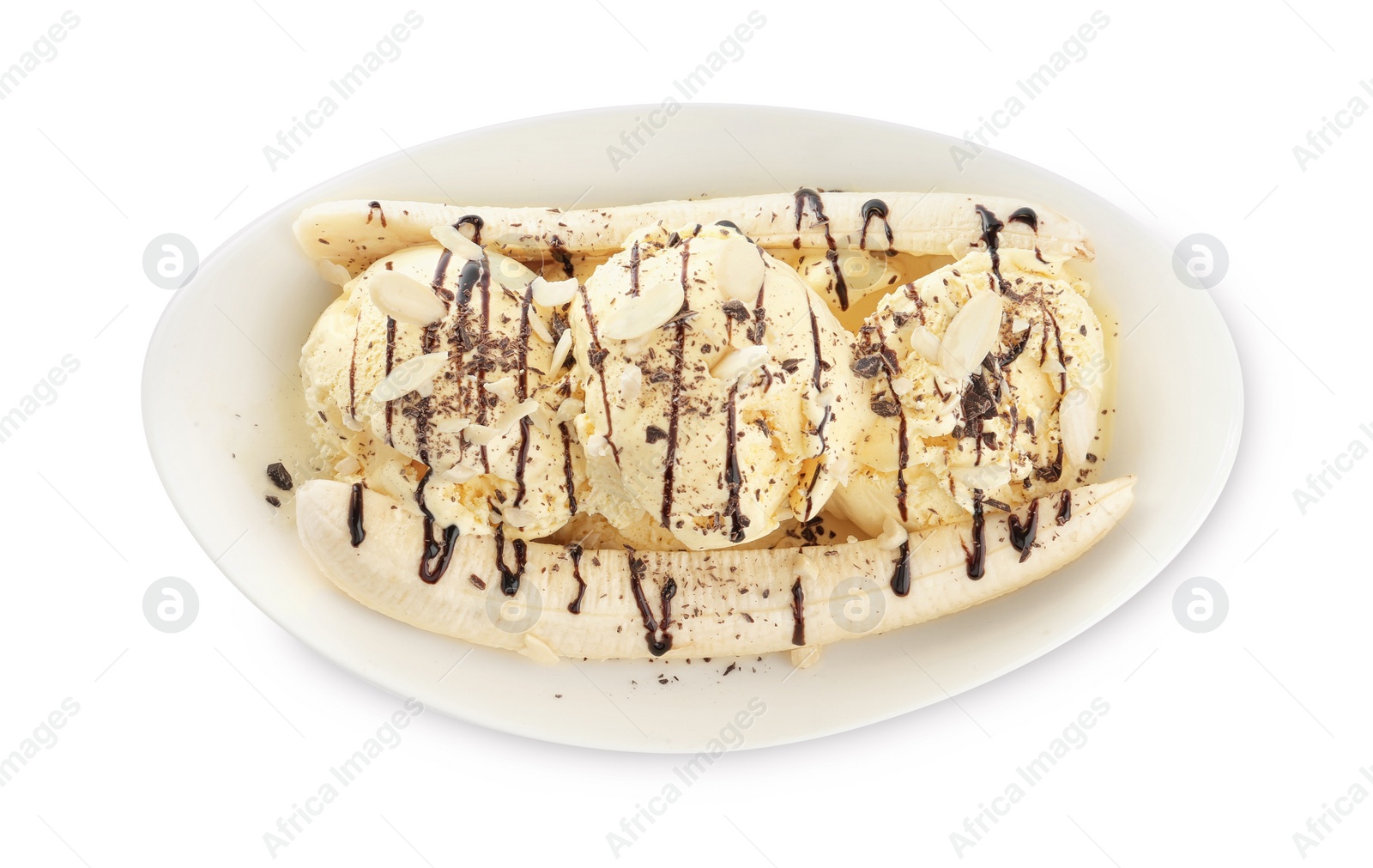 Photo of Delicious banana split ice cream with toppings isolated on white, top view