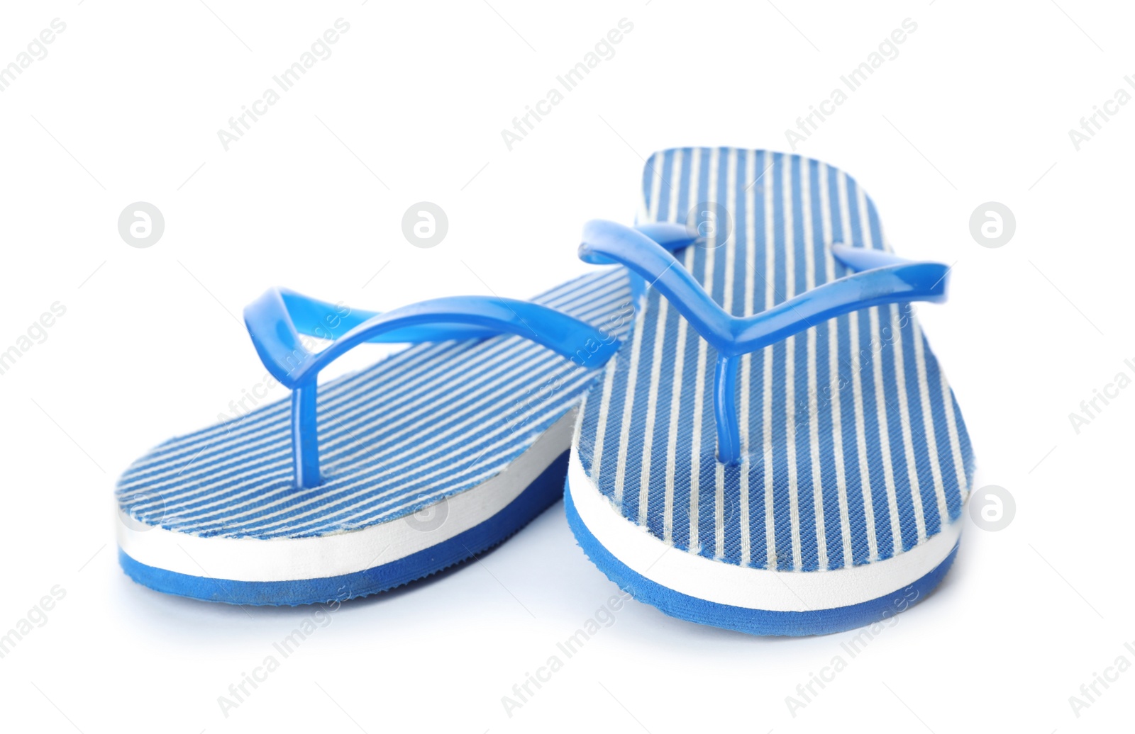 Photo of Bright flip flops on white background. Beach object