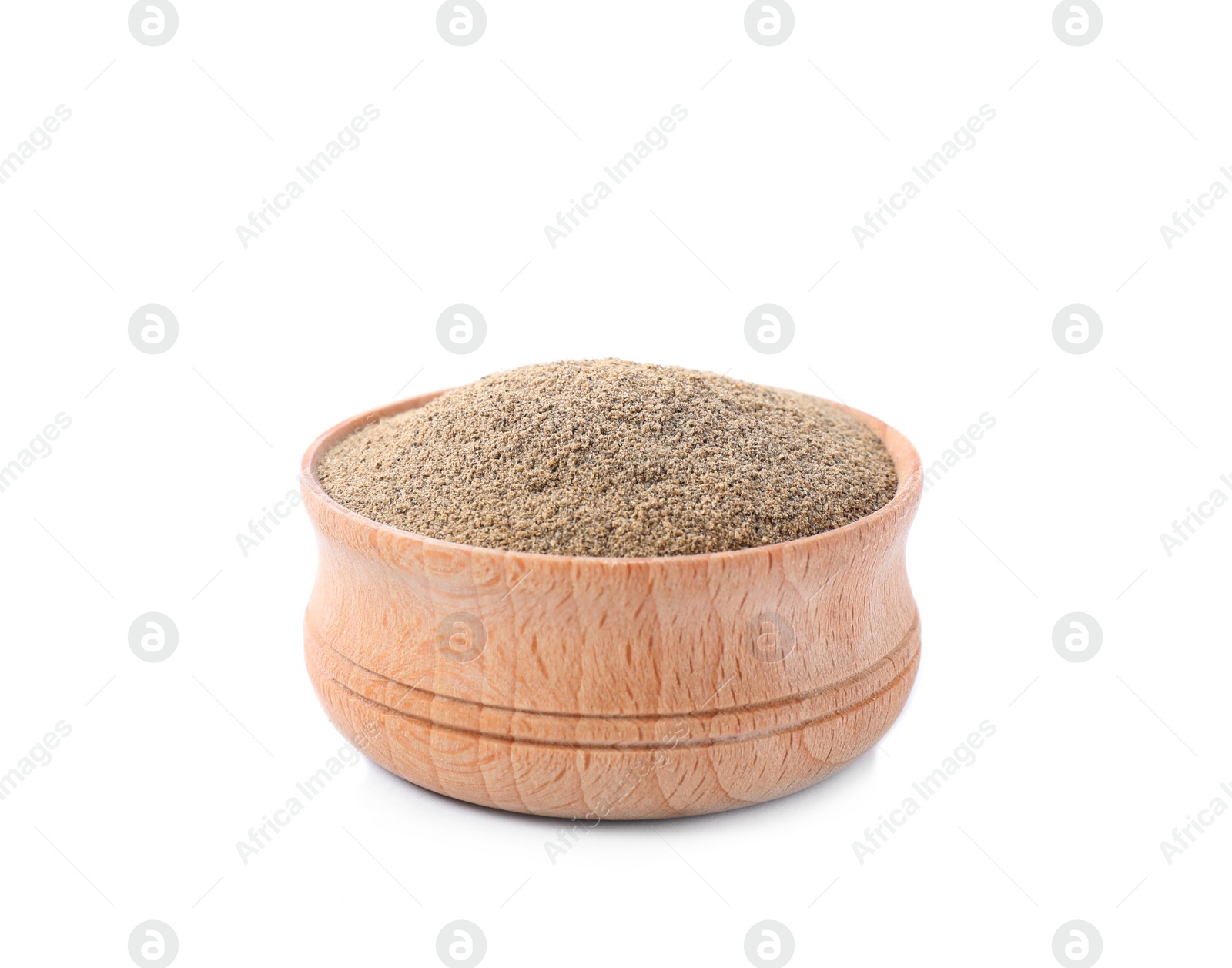 Photo of Milled pepper in wooden bowl isolated on white