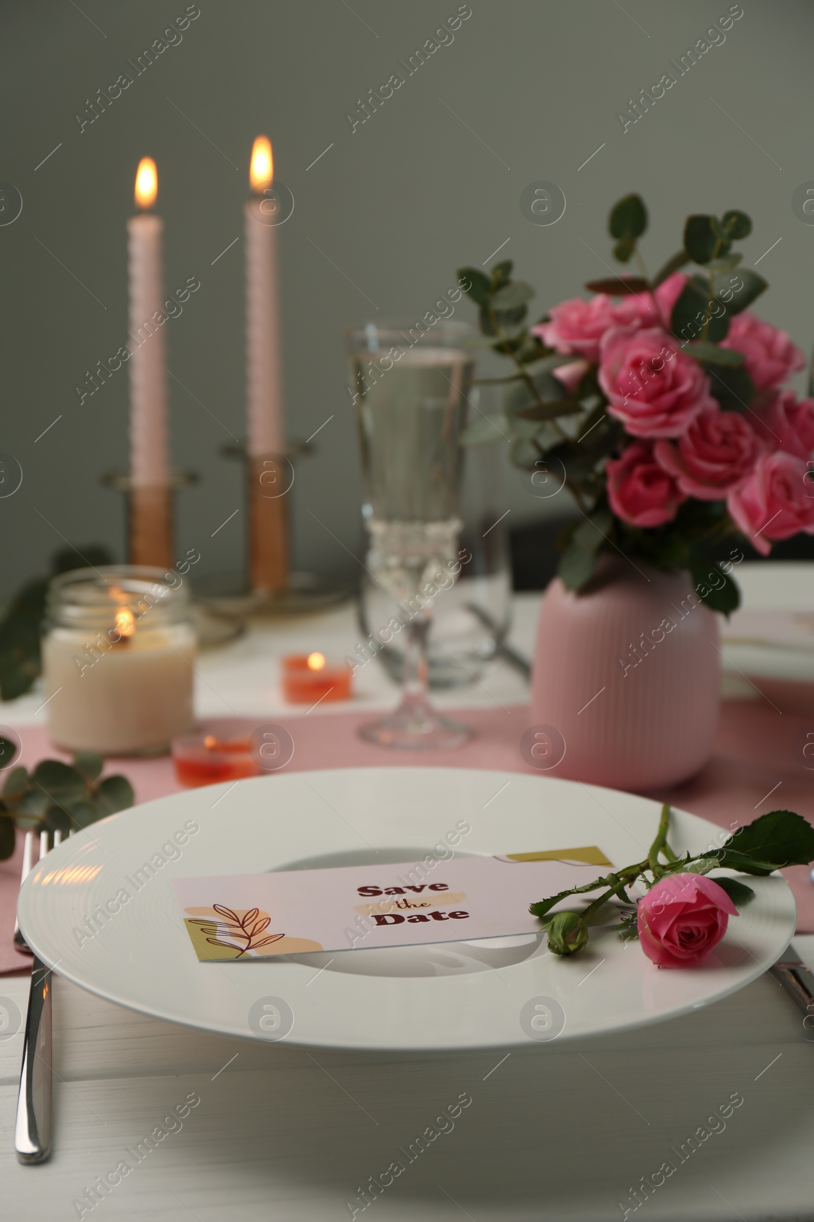 Photo of Romantic table setting with flowers and candles