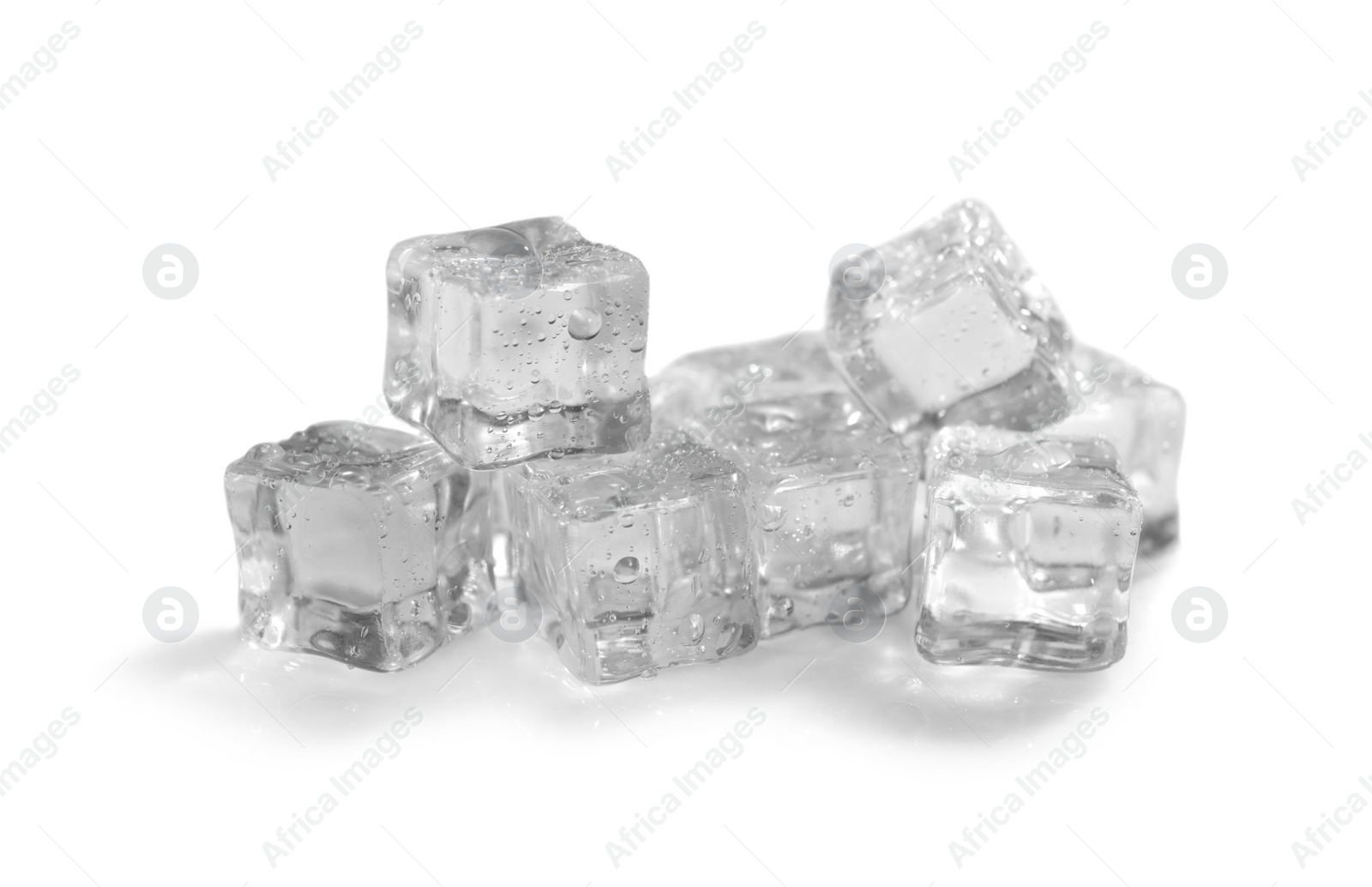 Photo of Pile of crystal clear ice cubes on white background