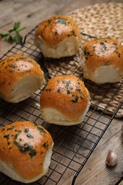 Traditional Ukrainian bread (Pampushky) with garlic on wooden table