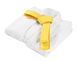 Photo of Yellow karate belt and kimono isolated on white