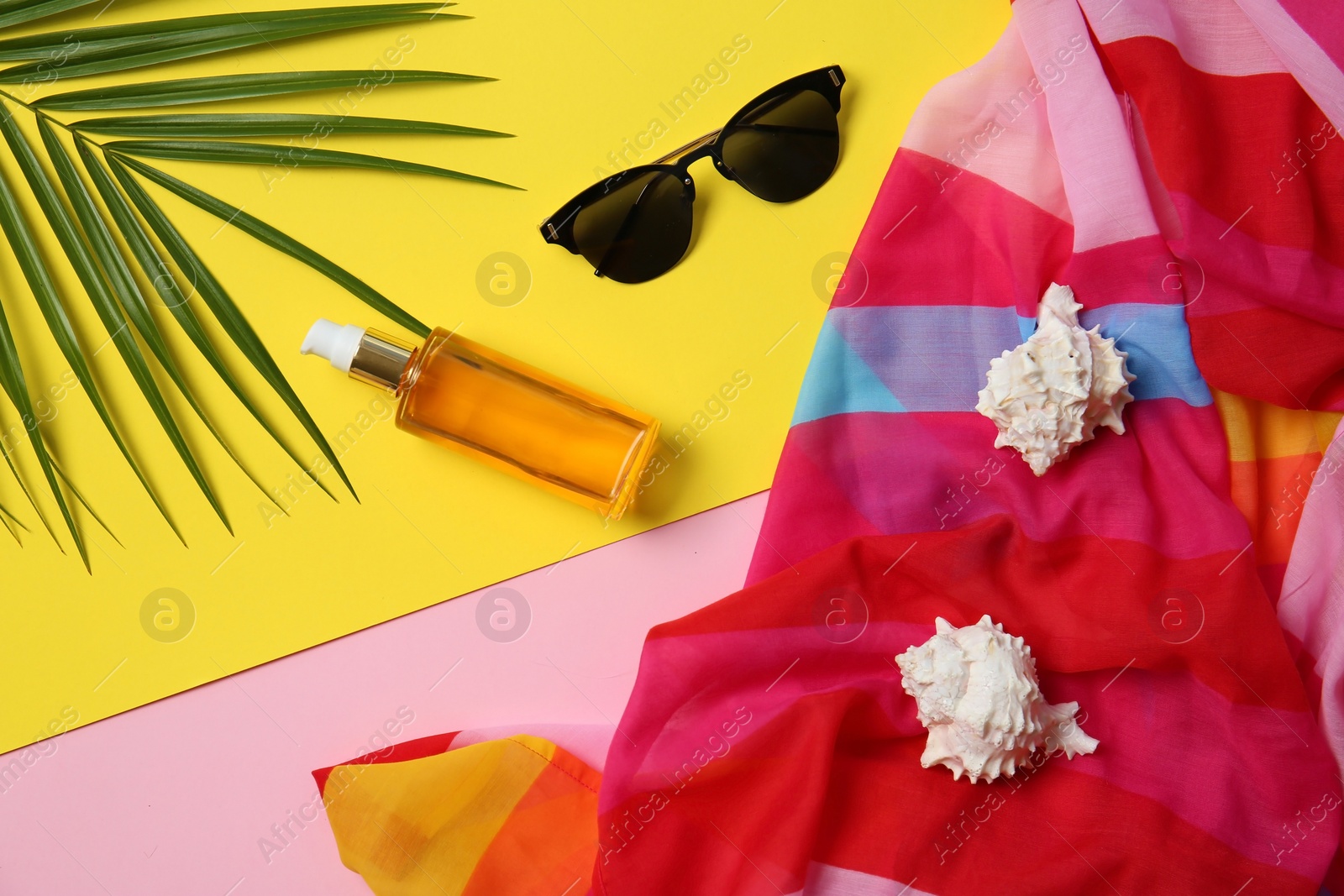 Photo of Flat lay composition with seashells and beach objects on color background