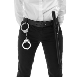 Photo of Female security guard with handcuffs and police baton on white background