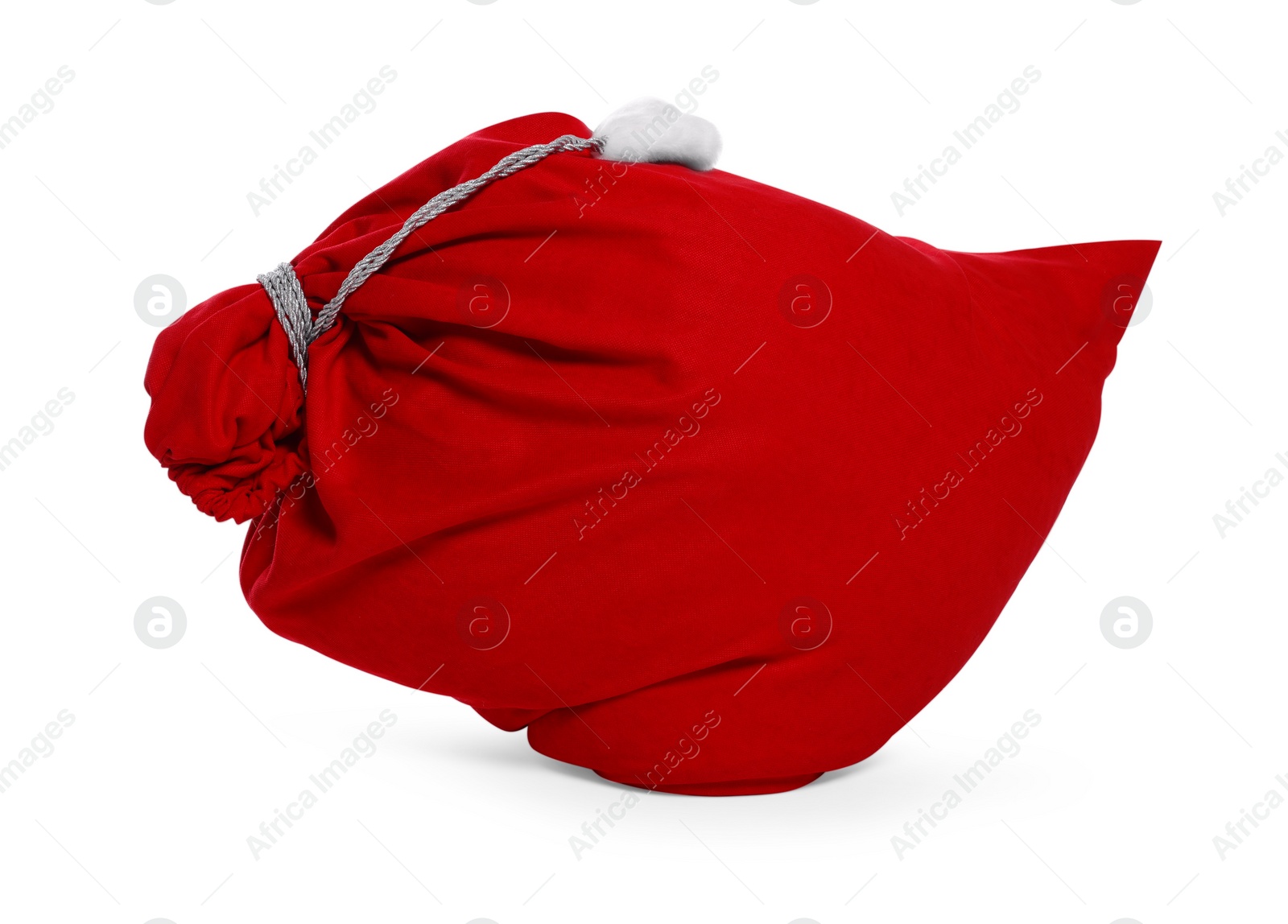 Photo of Santa Claus red bag full of presents isolated on white