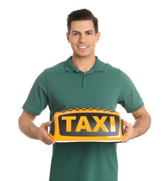 Man holding taxi sign on white background