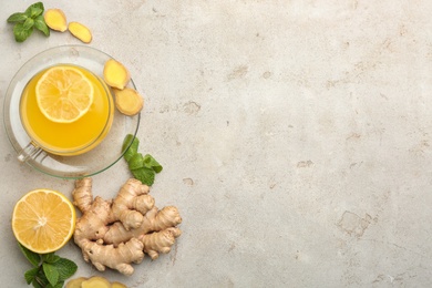 Photo of Flat lay composition with immunity boosting drink on light table. Space for text