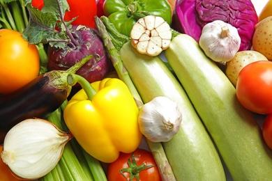 Photo of Many fresh ripe vegetables as background. Organic food