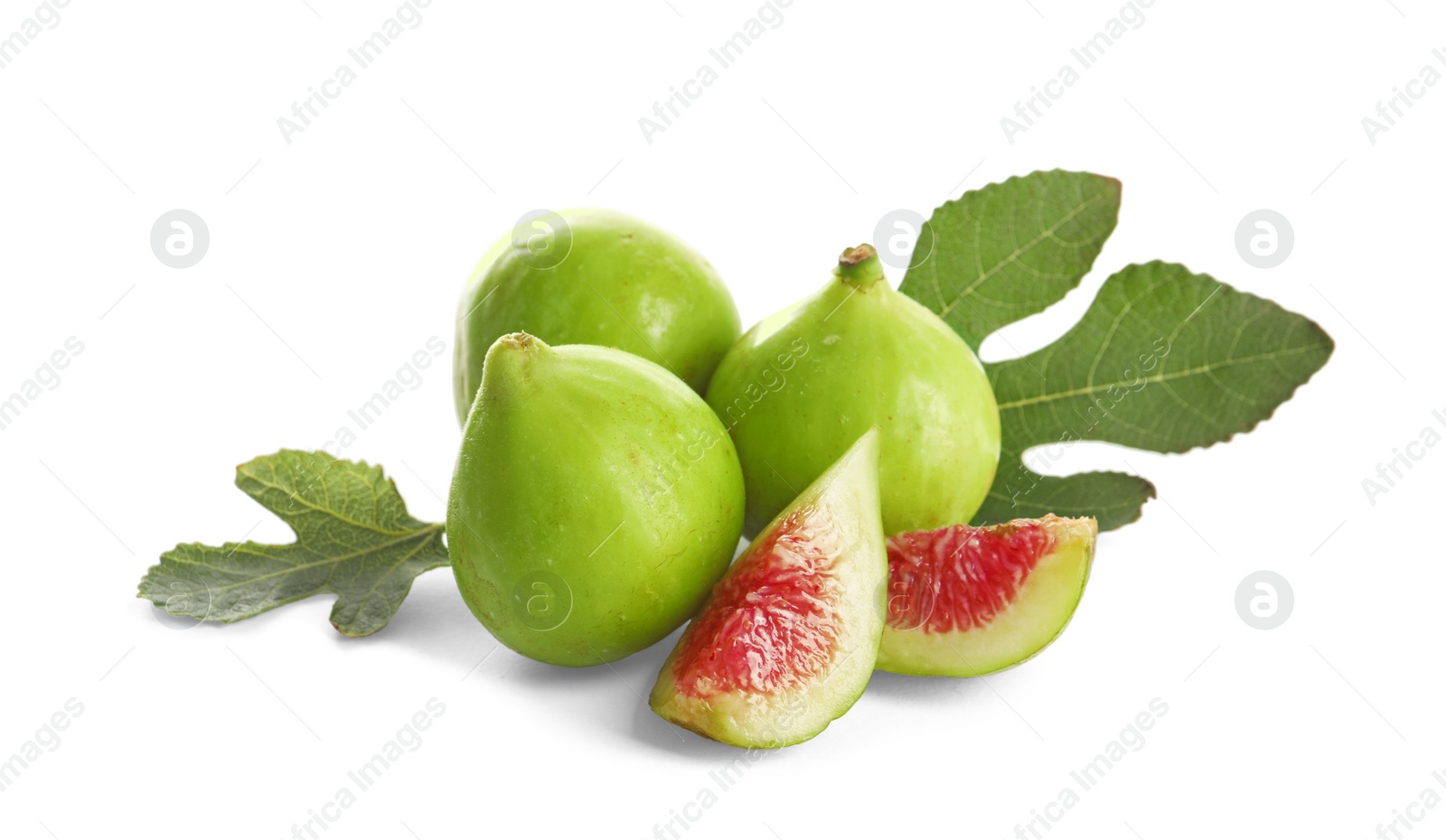 Photo of Whole and cut green figs on white background