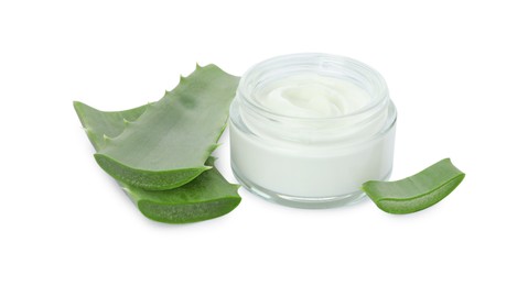 Photo of Jar of natural cream and cut aloe leaves isolated on white