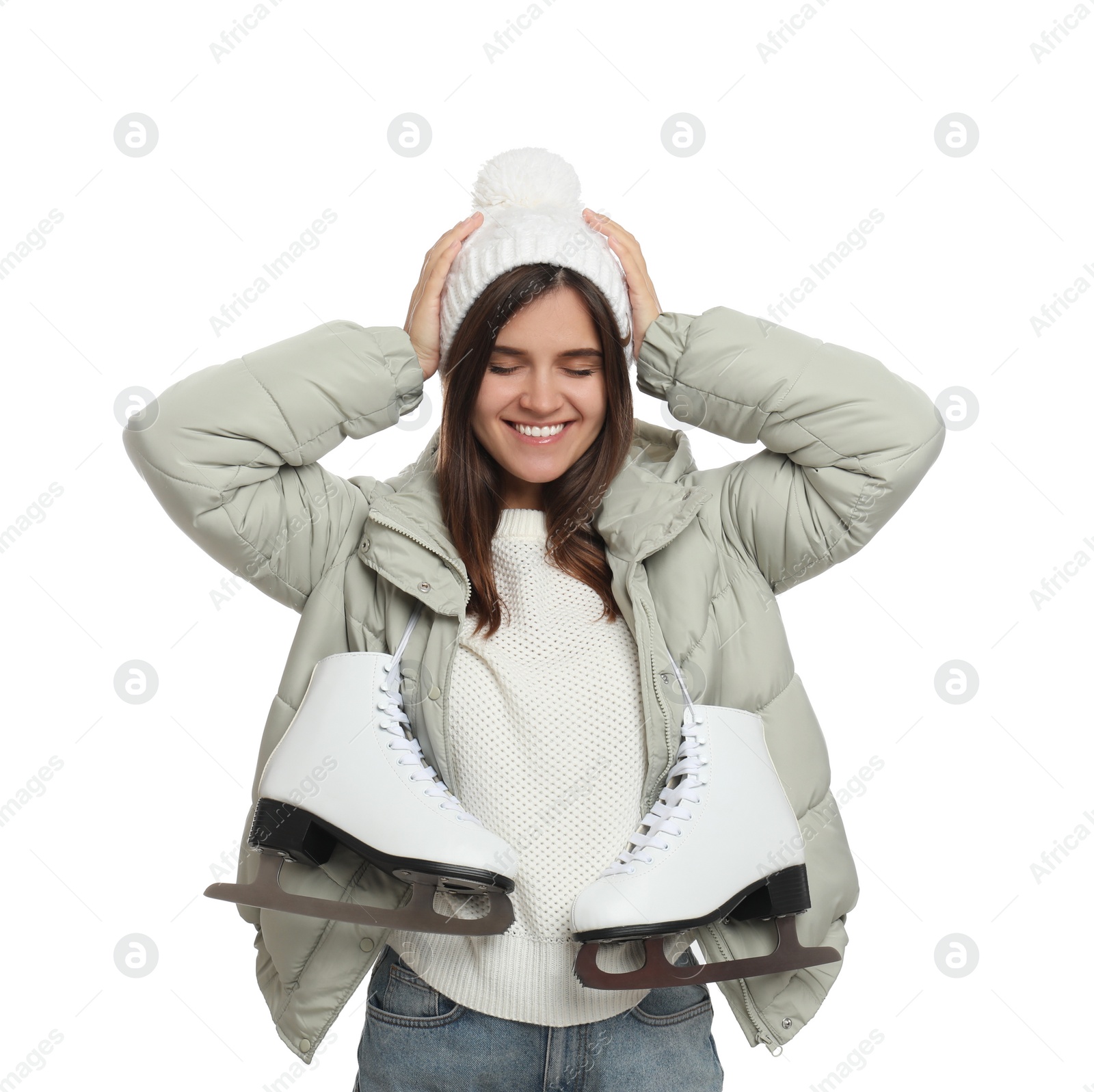 Photo of Happy woman with ice skates on white background