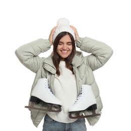 Photo of Happy woman with ice skates on white background