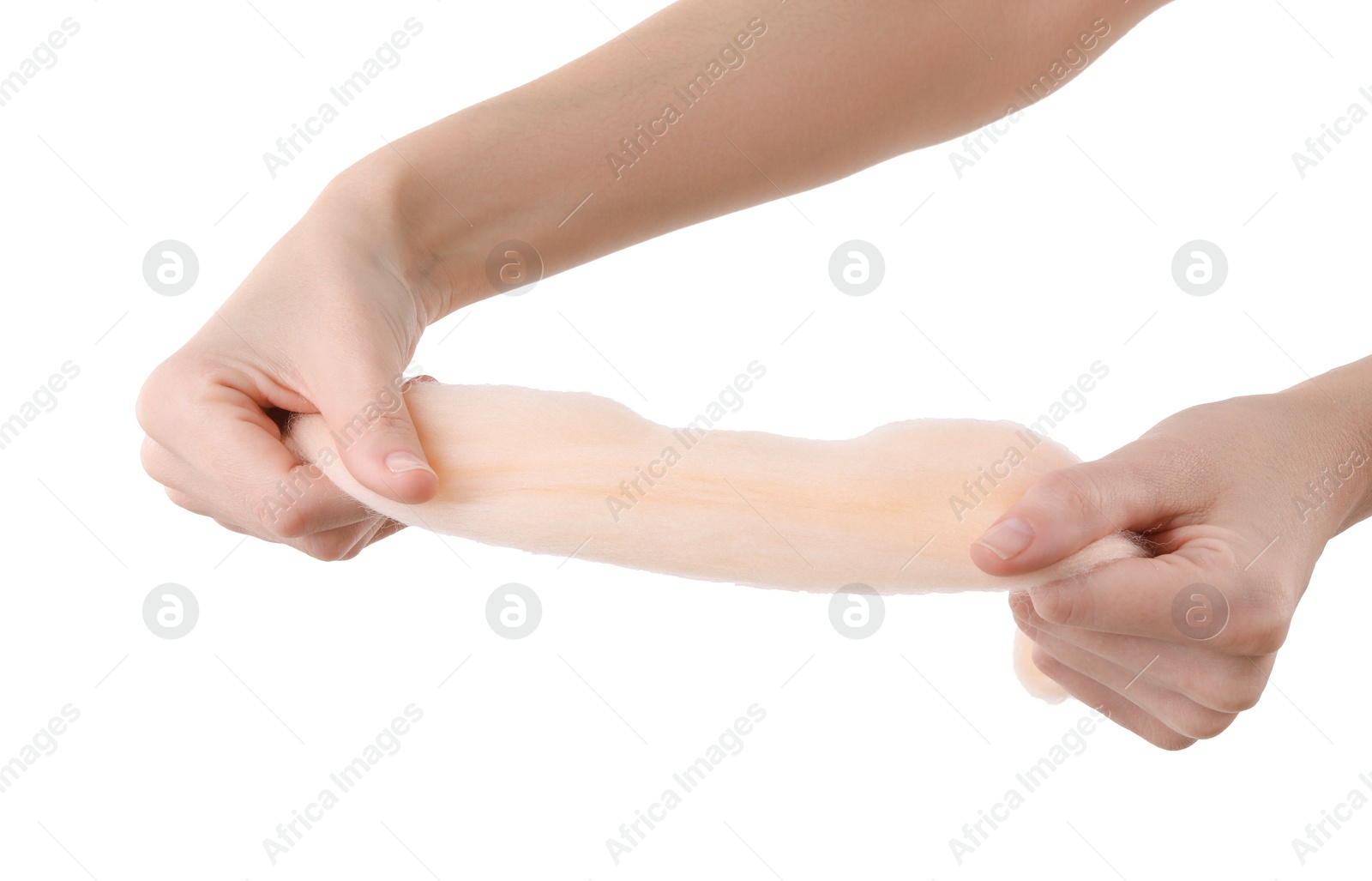 Photo of Woman holding beige felting wool on white background, closeup