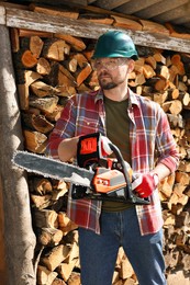 Photo of Man with modern saw on sunny day
