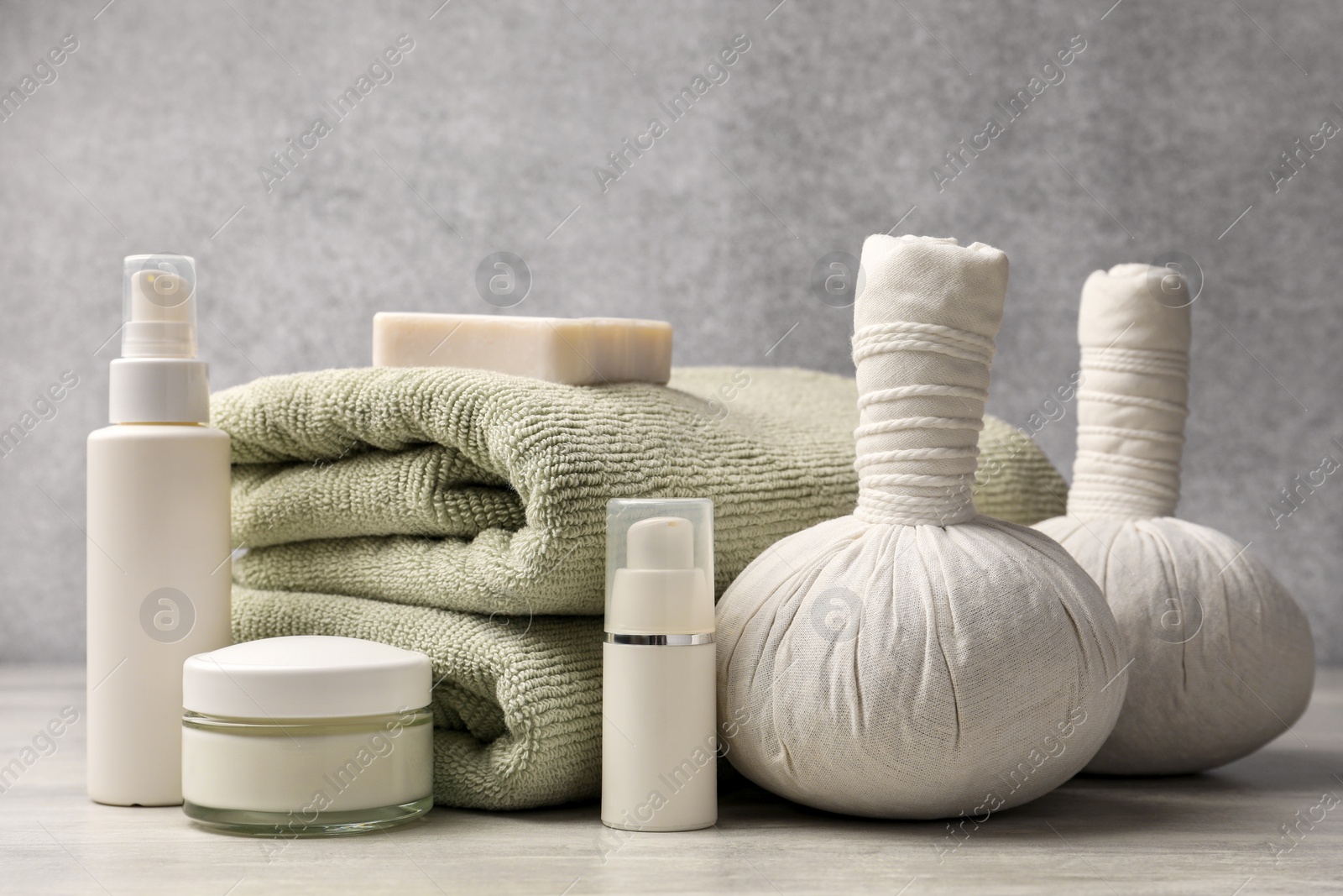 Photo of Composition with spa products on grey wooden table