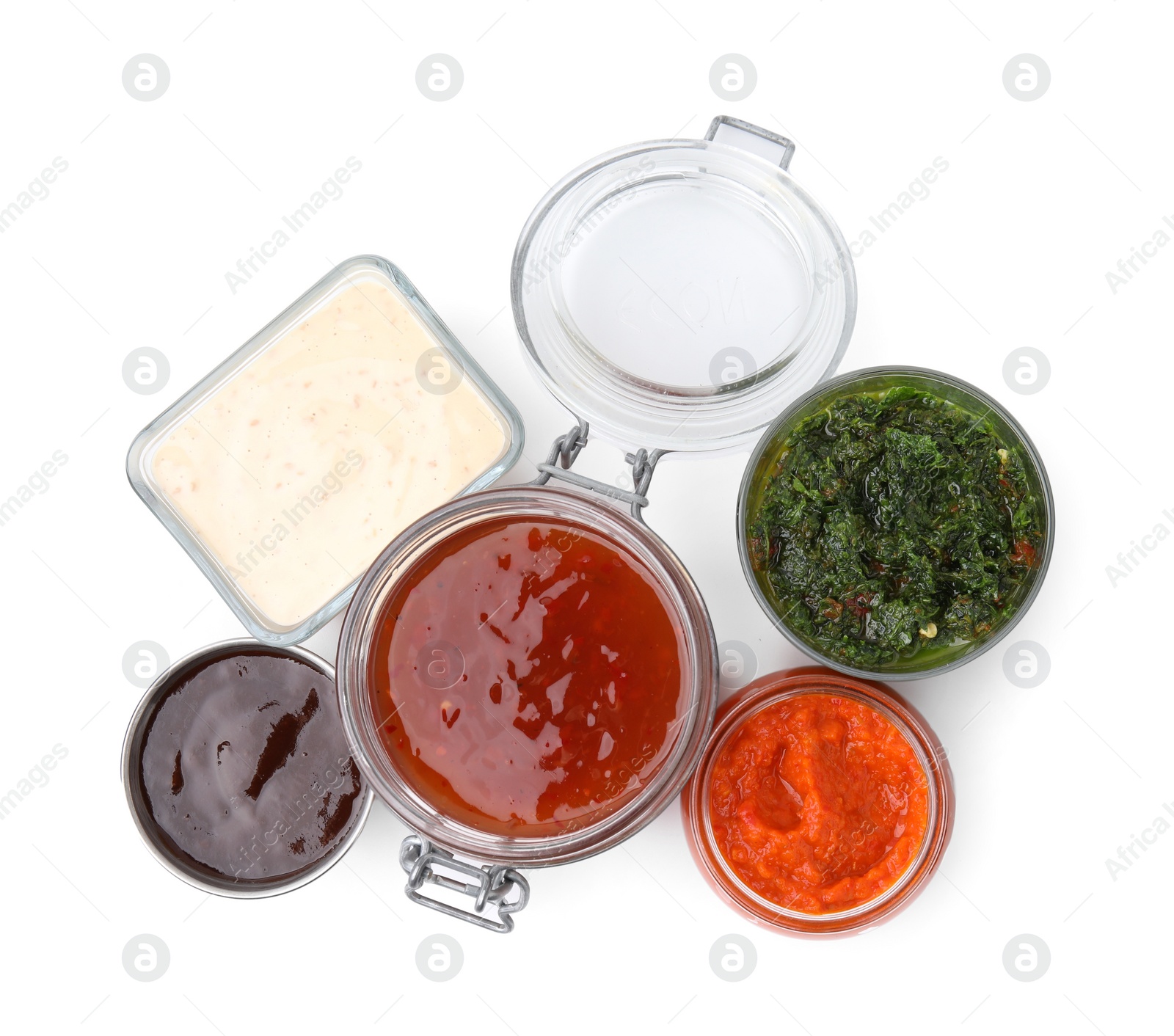 Photo of Different marinades isolated on white, top view