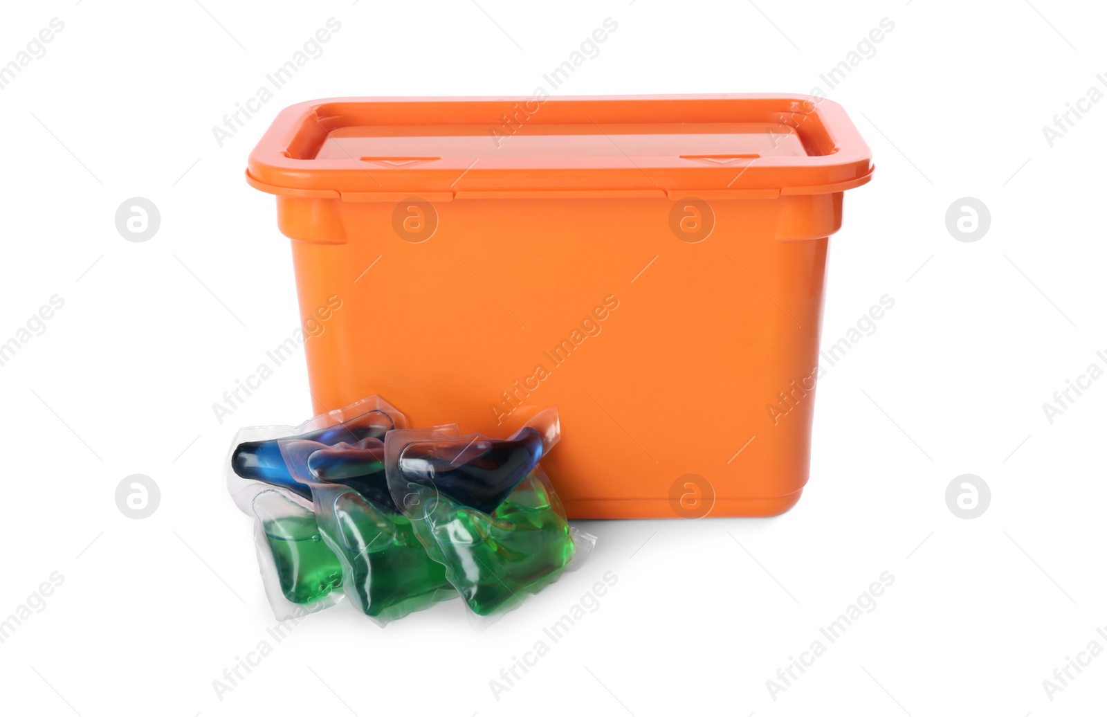 Photo of Laundry capsules and box on white background