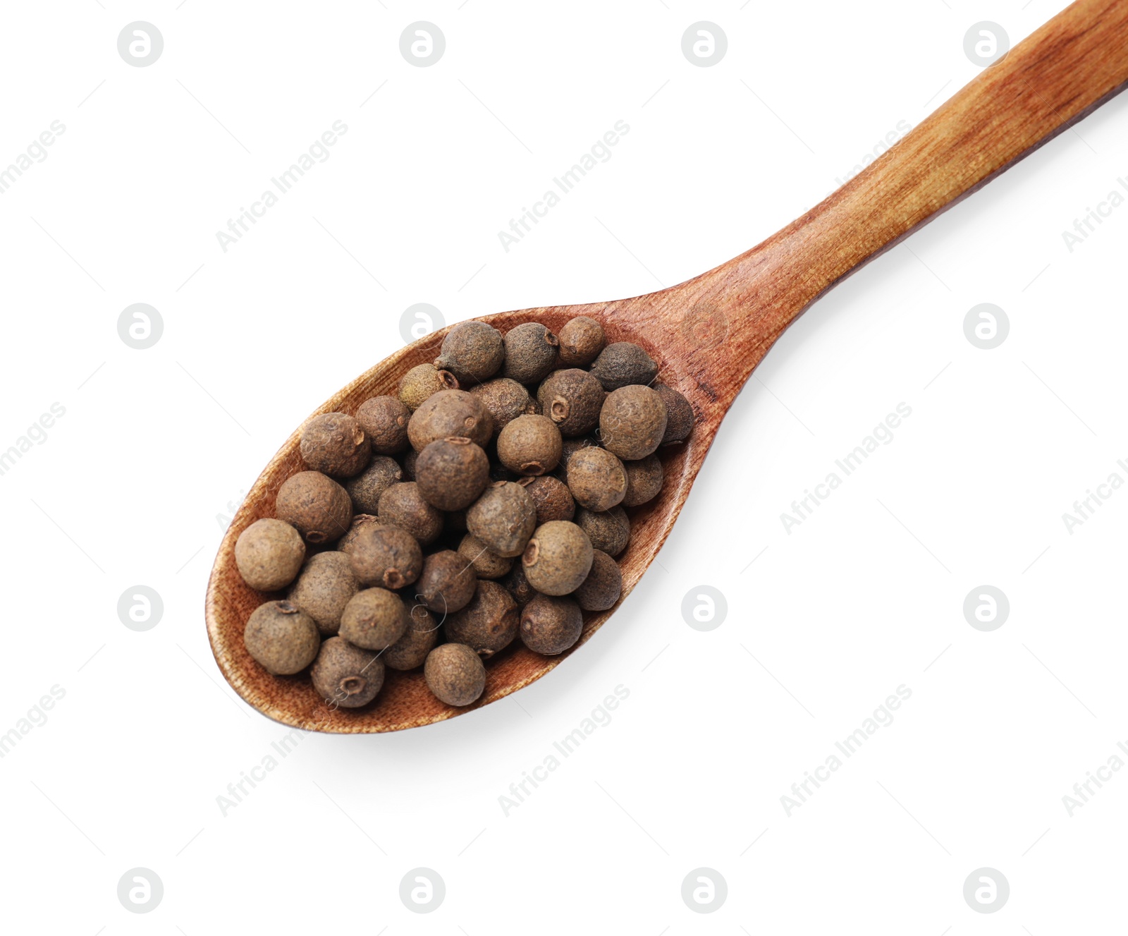 Photo of Dry allspice berries (Jamaica pepper) in spoon isolated on white, top view