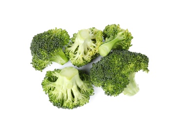 Photo of Fresh green broccoli on white background, top view. Organic food