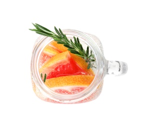 Photo of Mason jar of infused water with grapefruit slices isolated on white, top view