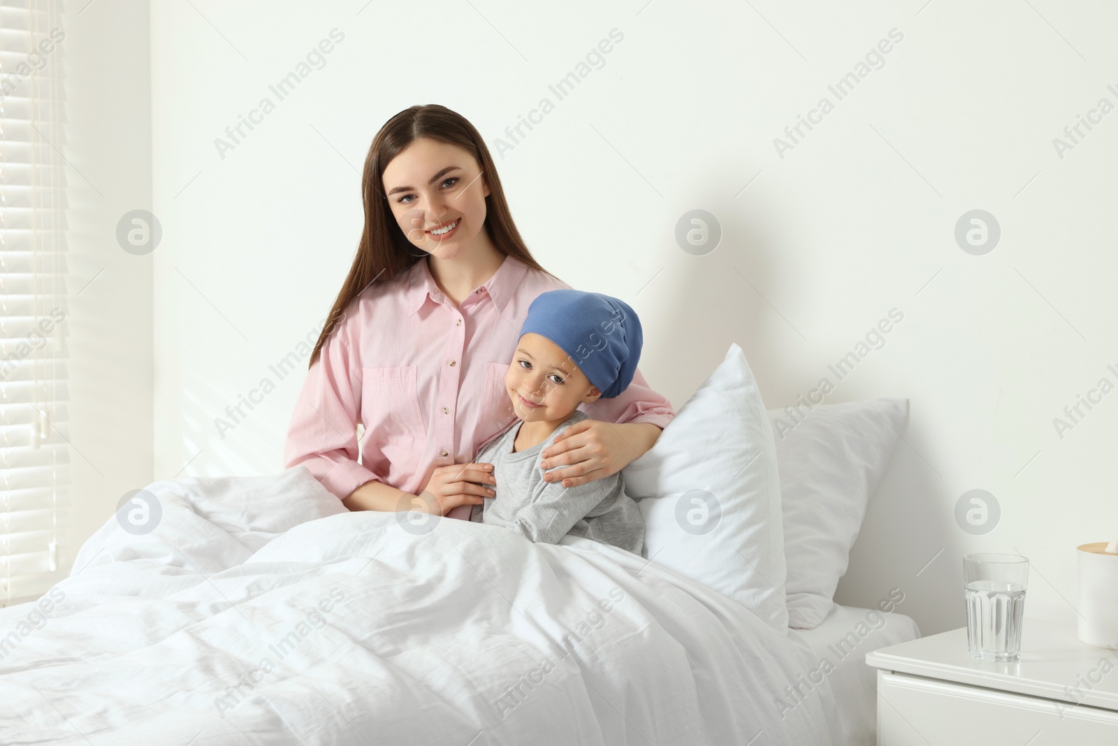 Photo of Childhood cancer. Mother and daughter in hospital