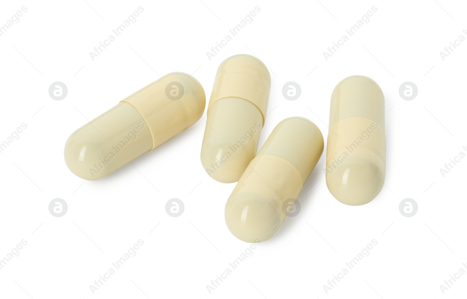 Photo of Vitamin capsules isolated on white. Health supplement