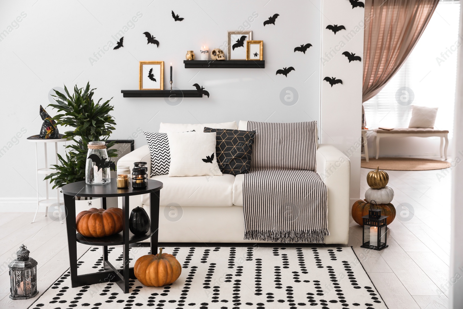 Photo of Modern room decorated for Halloween. Idea for festive interior