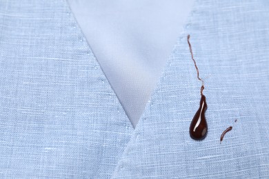 Dirty vest with drops of chocolate, closeup view