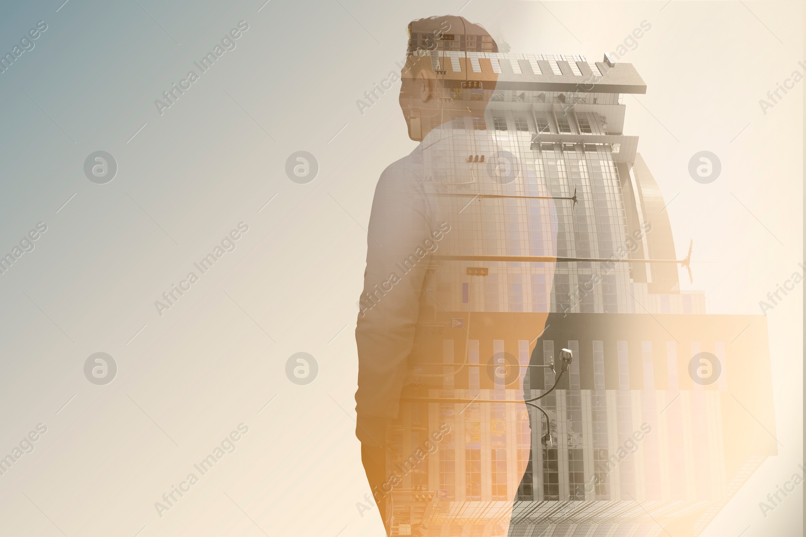 Image of Double exposure of businessman and cityscape with office buildings