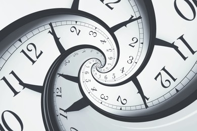 Image of Infinity and other time related concepts. White clock face twisted in spiral, fractal pattern